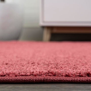Haze Solid Low-pile Area Rug Red